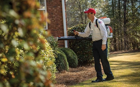 an Aiken pest professional treating for mosquitoes