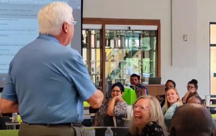 man teaching a class